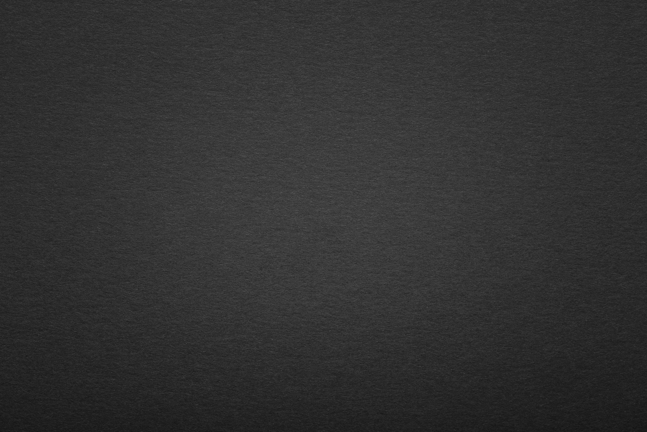 Black paper texture with vignette